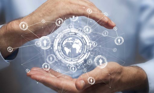 Businessman-holding-in-hand-a-global-connectioncommunications-510x310